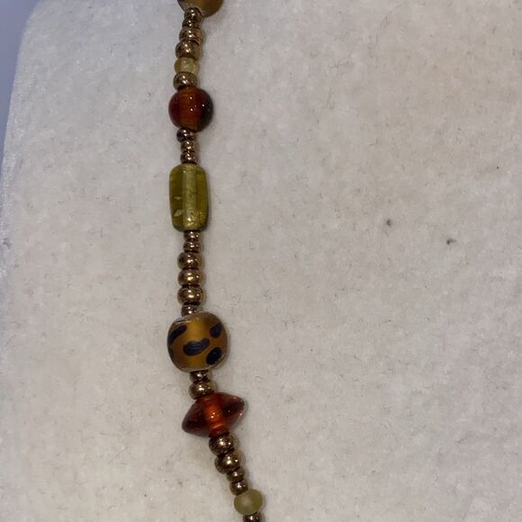 Vintage Boho Beaded Necklace with Drop Dangle Caged Bead Brown and Gold Accents - Picture 9 of 11